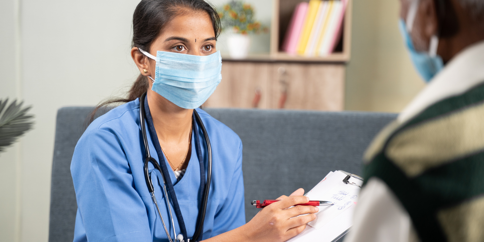 doctor speaking with patient