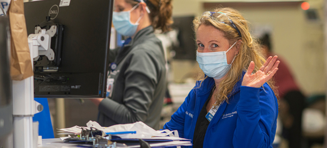 Provider waving at the camera | Doylestown Health